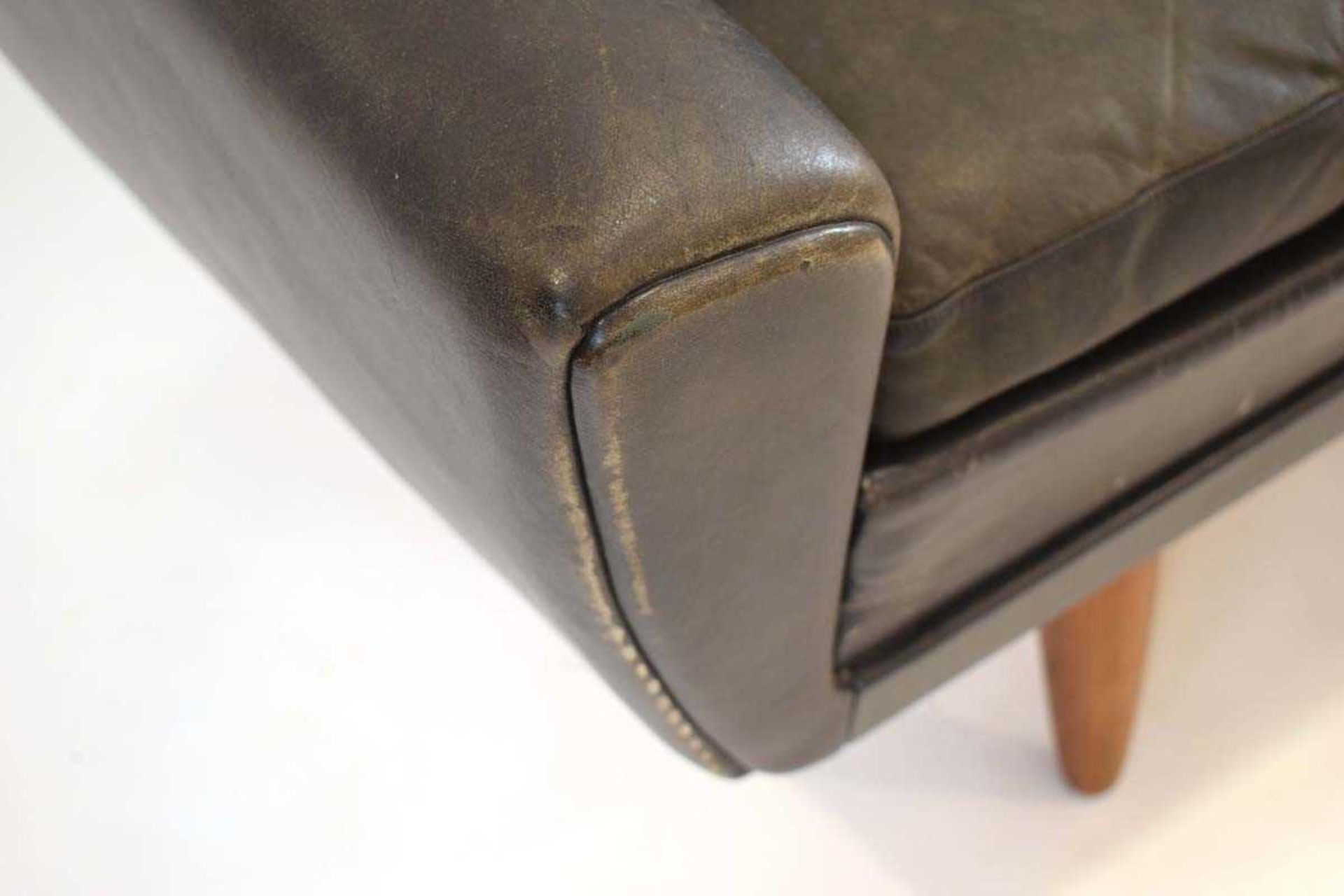 A 1960's Danish black leather three-seater sofa on teak tapering legs*Sold subject to our Soft - Image 6 of 6