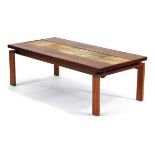 A Danish rosewood, crossbanded and tile topped occasional table by Trioh, the rectangular surface