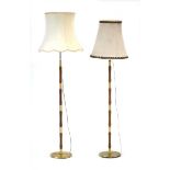 A pair of 1960's Danish teak and brass standard lamps with associated shadesSee images. Leads cut.