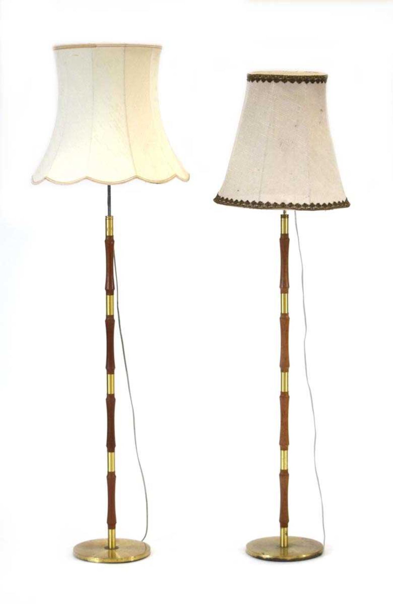 A pair of 1960's Danish teak and brass standard lamps with associated shadesSee images. Leads cut.