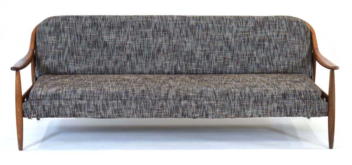 Greaves & Thomas, a 1960's 'Put-u-Up' Davenport Villager sofa bed with sculptural afromesian arms *