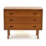 A 1960's Danish teak chest of three drawers with shaped handles, on later bulbous legs, w. 84