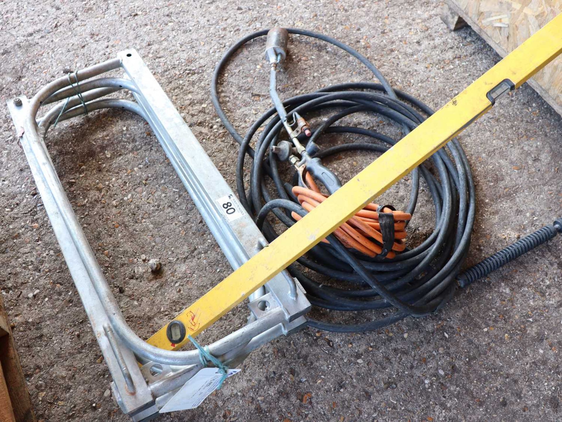 +VAT Pair of galvanised gates, spirit level, a high pressure hose and a burner tool with hose