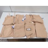+VAT A bag containing 8 Ladies DKNY Joggers in Beige in Large.