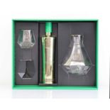 +VAT An Au Vodka Green Watermelon Gift set with Custom Decanter & 1 glass, 70cl 35.2% (Note VAT