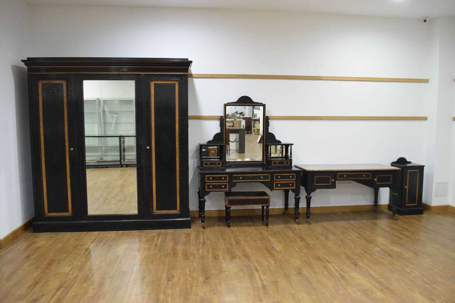 James Shoolbred of Tottenham Court Road, an ebonised, walnut highlighted and brass mounted bedroom