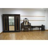 James Shoolbred of Tottenham Court Road, an ebonised, walnut highlighted and brass mounted bedroom