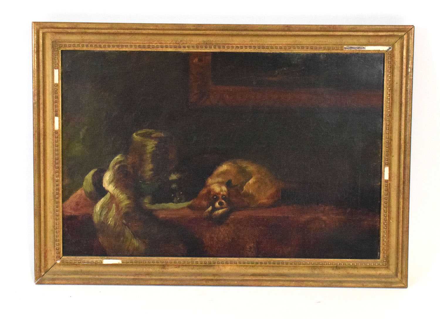 Early 20th Century English School,A pair of dogs sleeping in a sitting room,unsigned,oil on canvas,