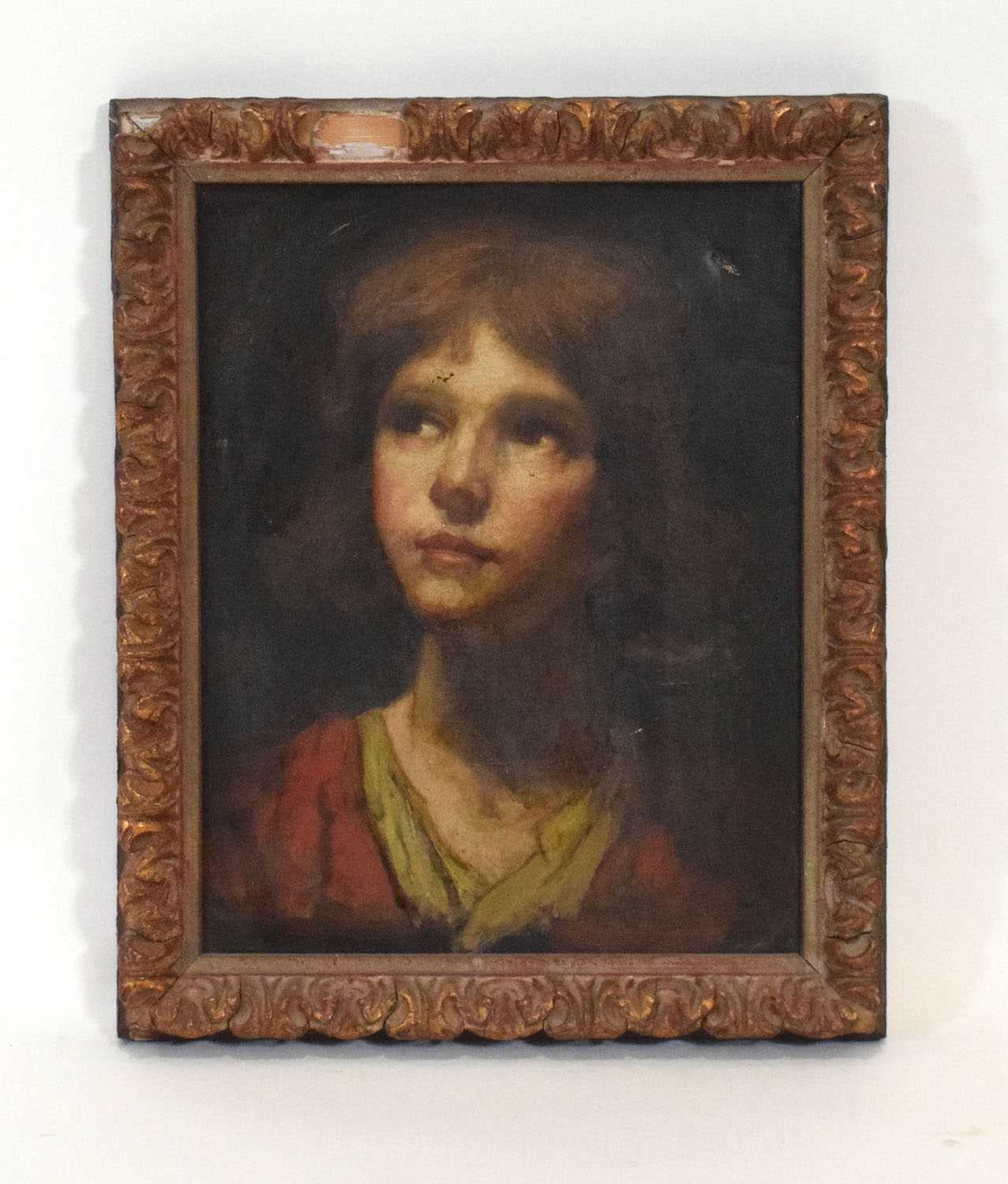 Early 20th Century School,A head and shoulders study of a pensive young lady,unsigned,oil on