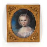 Early 20th Century English School,A head and shoulders portrait of a young girl,unsigned,pastels,