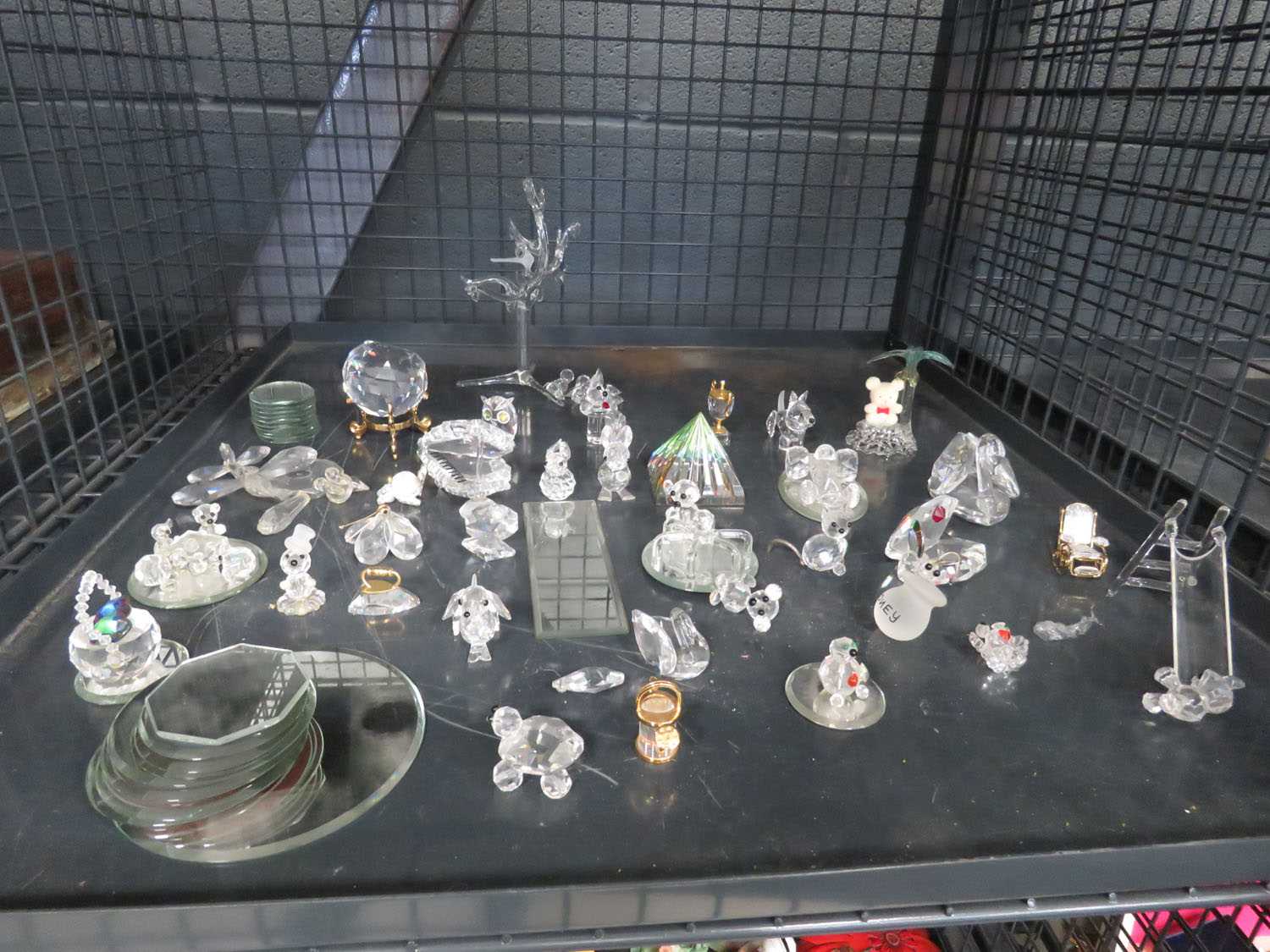 Cage containing a quantity of Swarovski style crystal ornaments