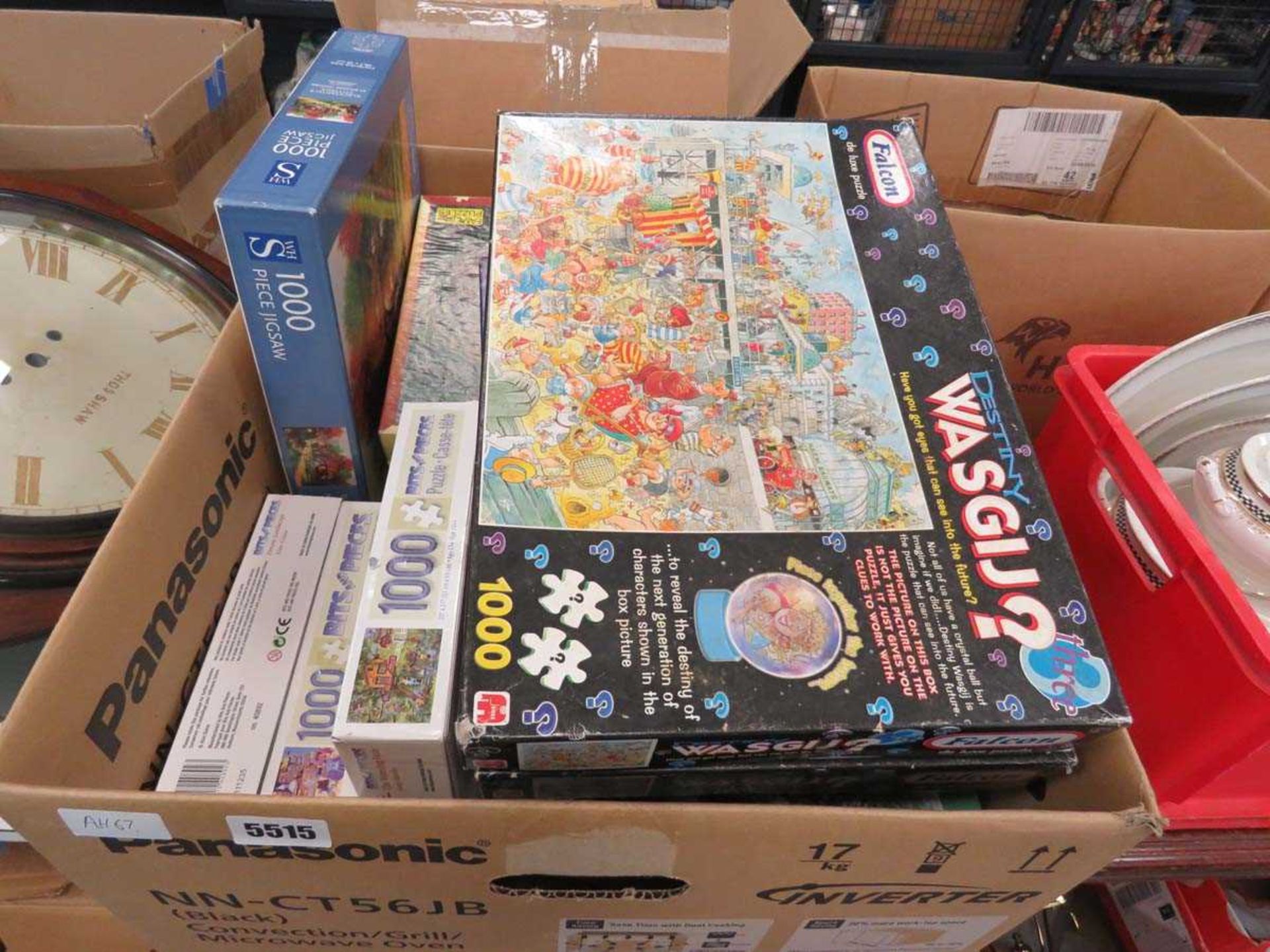 Box containing a quantity of jigsaw puzzles