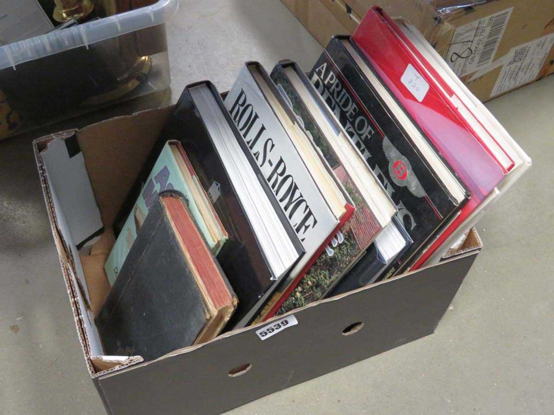 Box containing motorcar related reference books