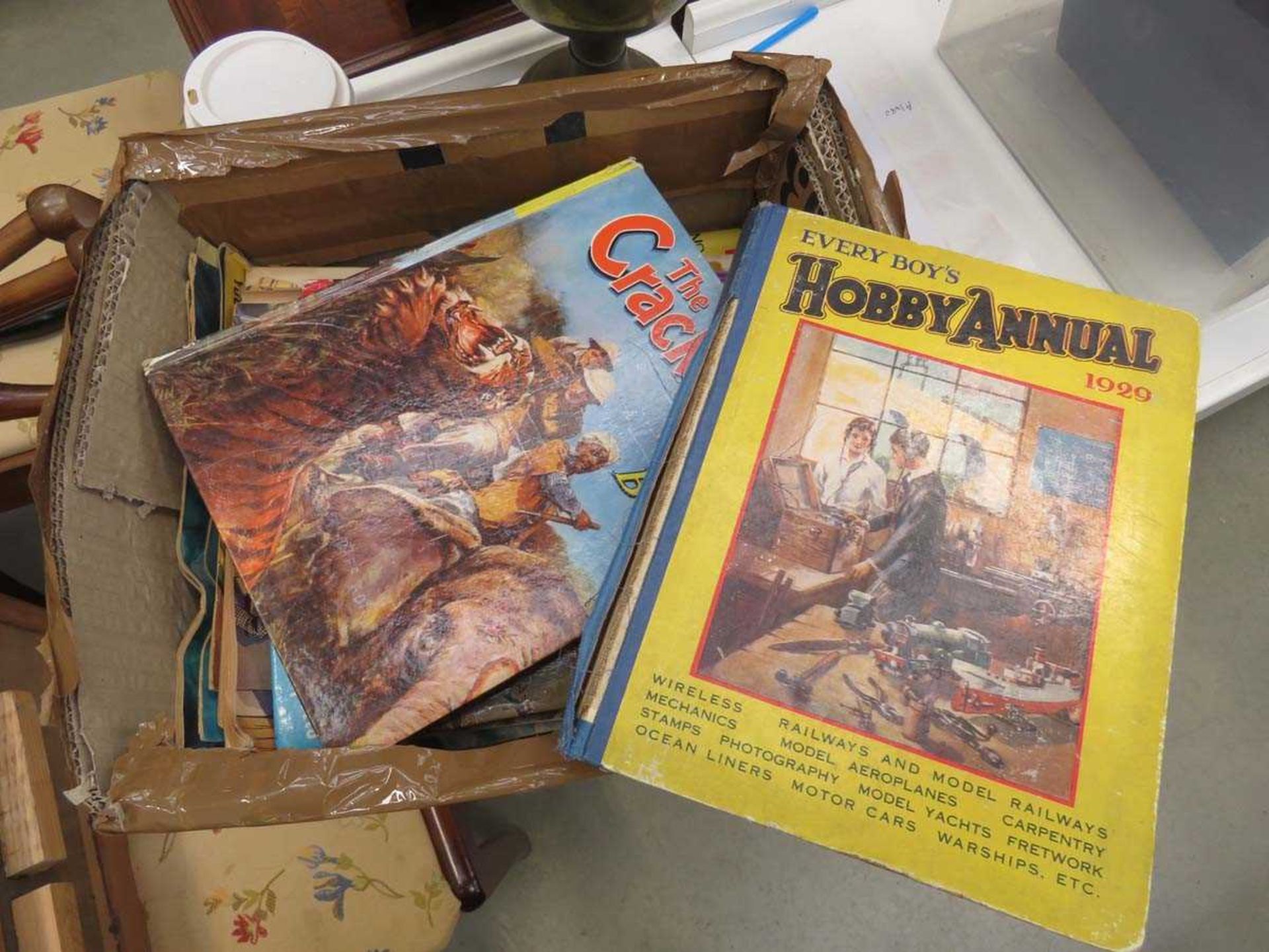 Box containing children's magazines and annuals