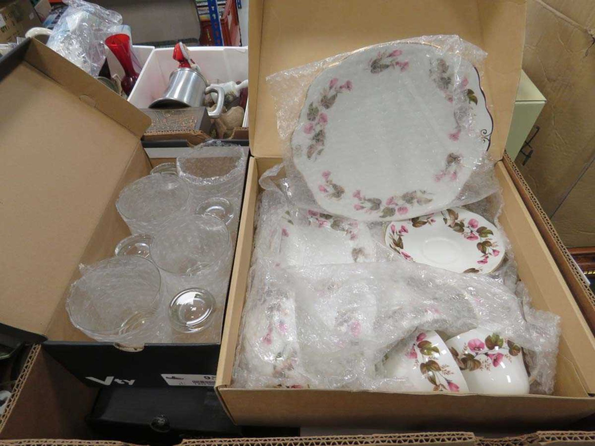 Box containing a duchess tea set, glass tumblers and sundae dishes