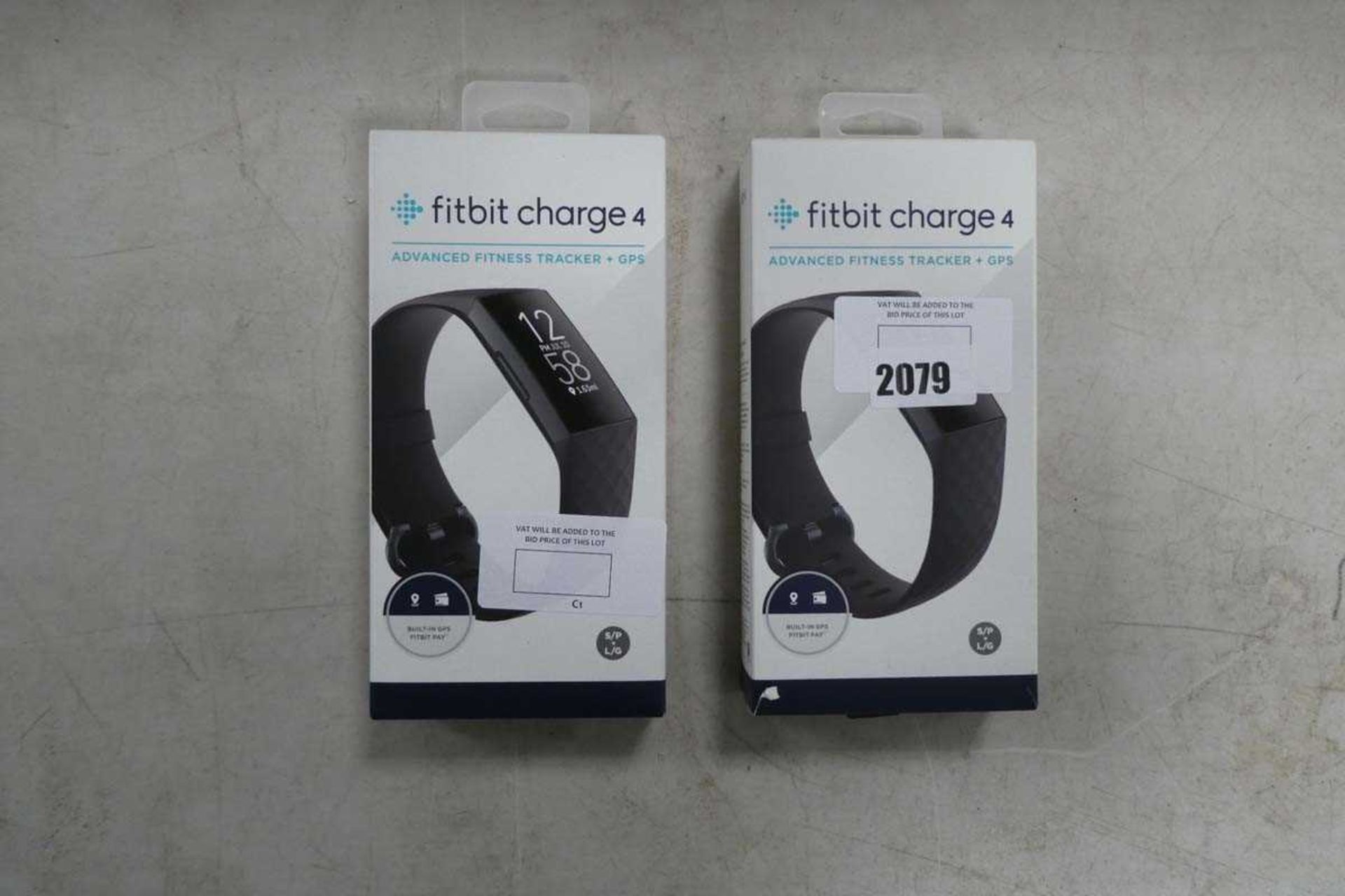 +VAT 2 FitBit Charge 4 activity wristbands in boxes