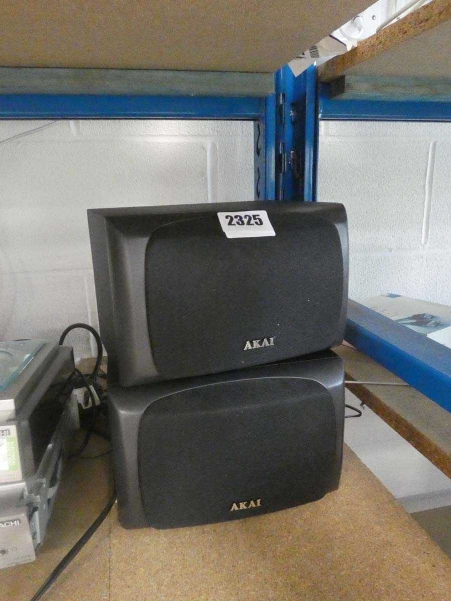 Two Akai satellite speakers