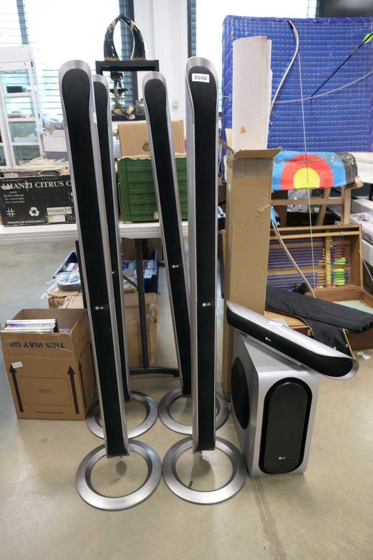 LG tower speakers together with centre speaker and subwoofer