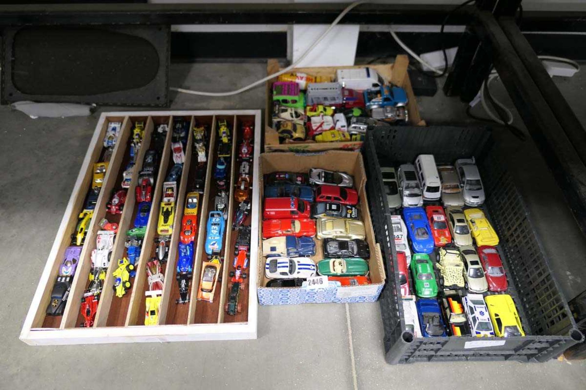 4 trays containing large selection of die cast vehicles