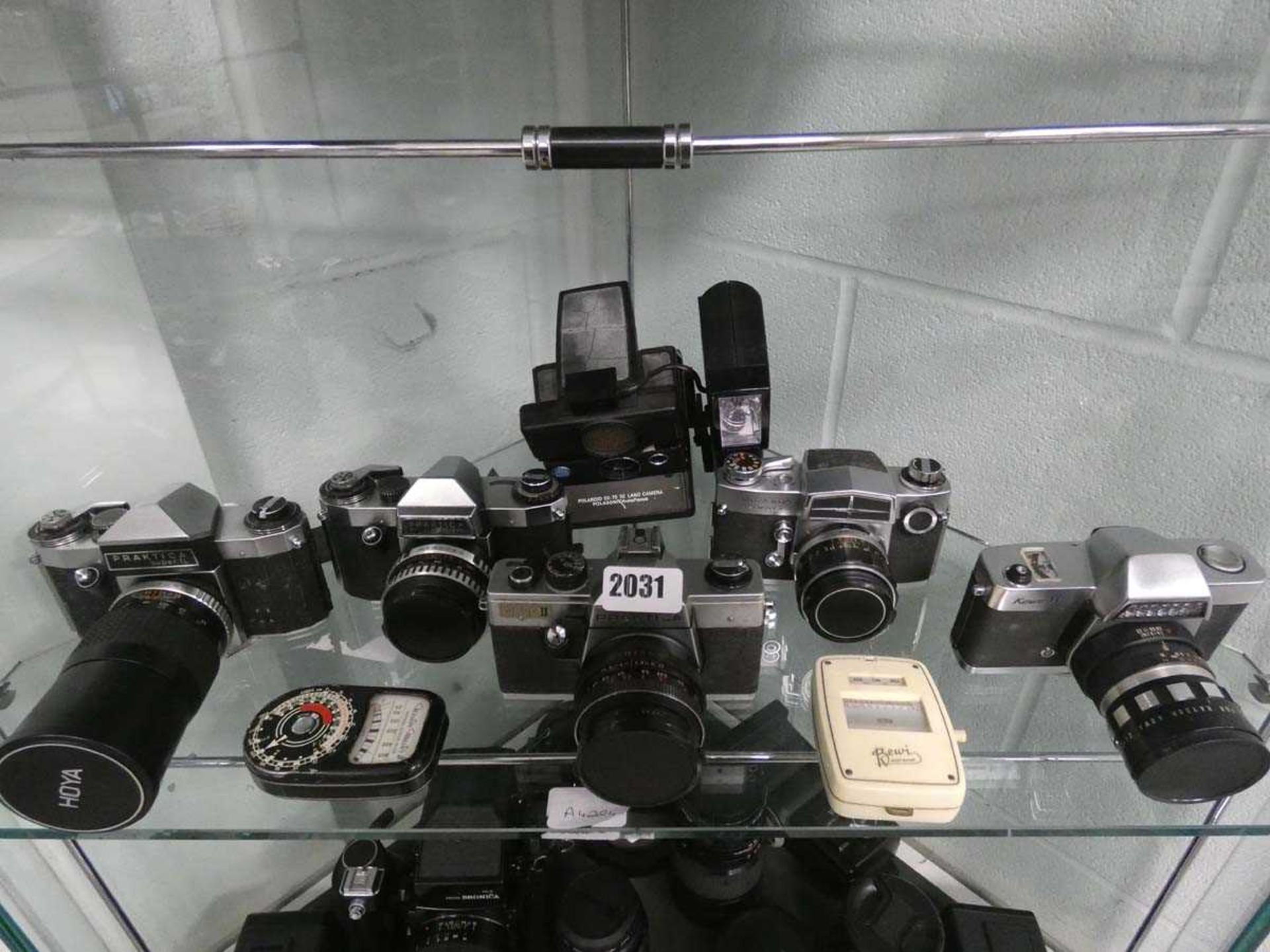 Selection of various film cameras to include Practica, Miranda and others with various lenses and