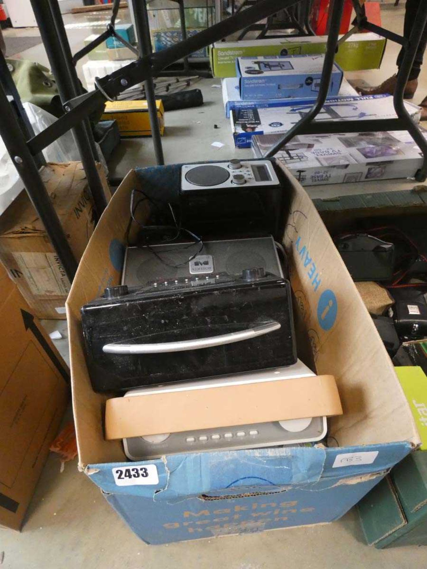 Box of various DAB radios including Roberts