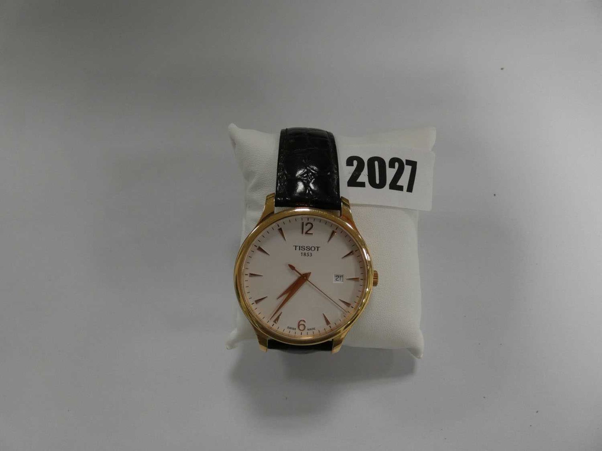 Gents gold plated Tissot leather strap watch with white circular dial and date