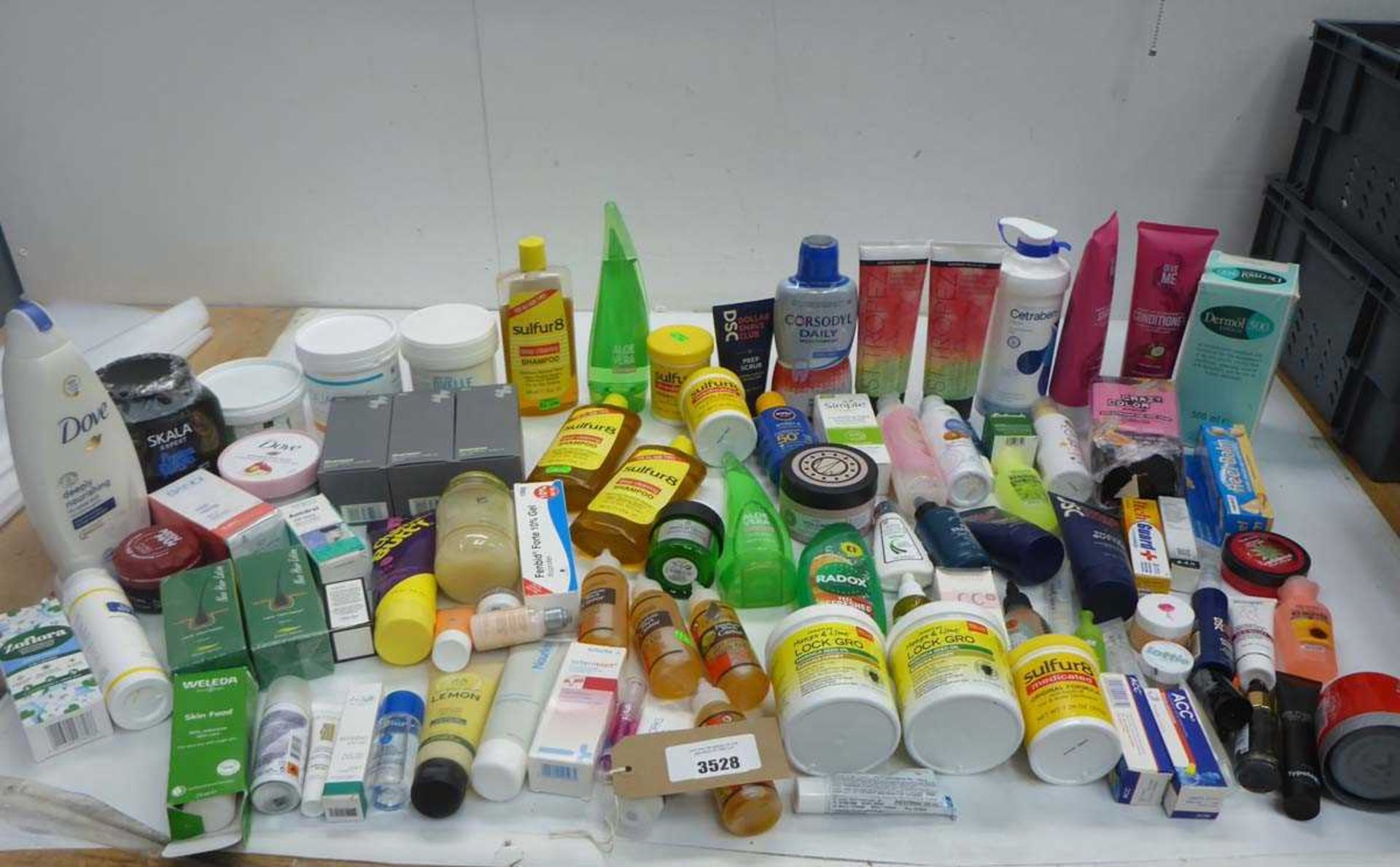 +VAT Large bag of toiletries including hair products, ointments, self tanner, moisturizers, lotions,