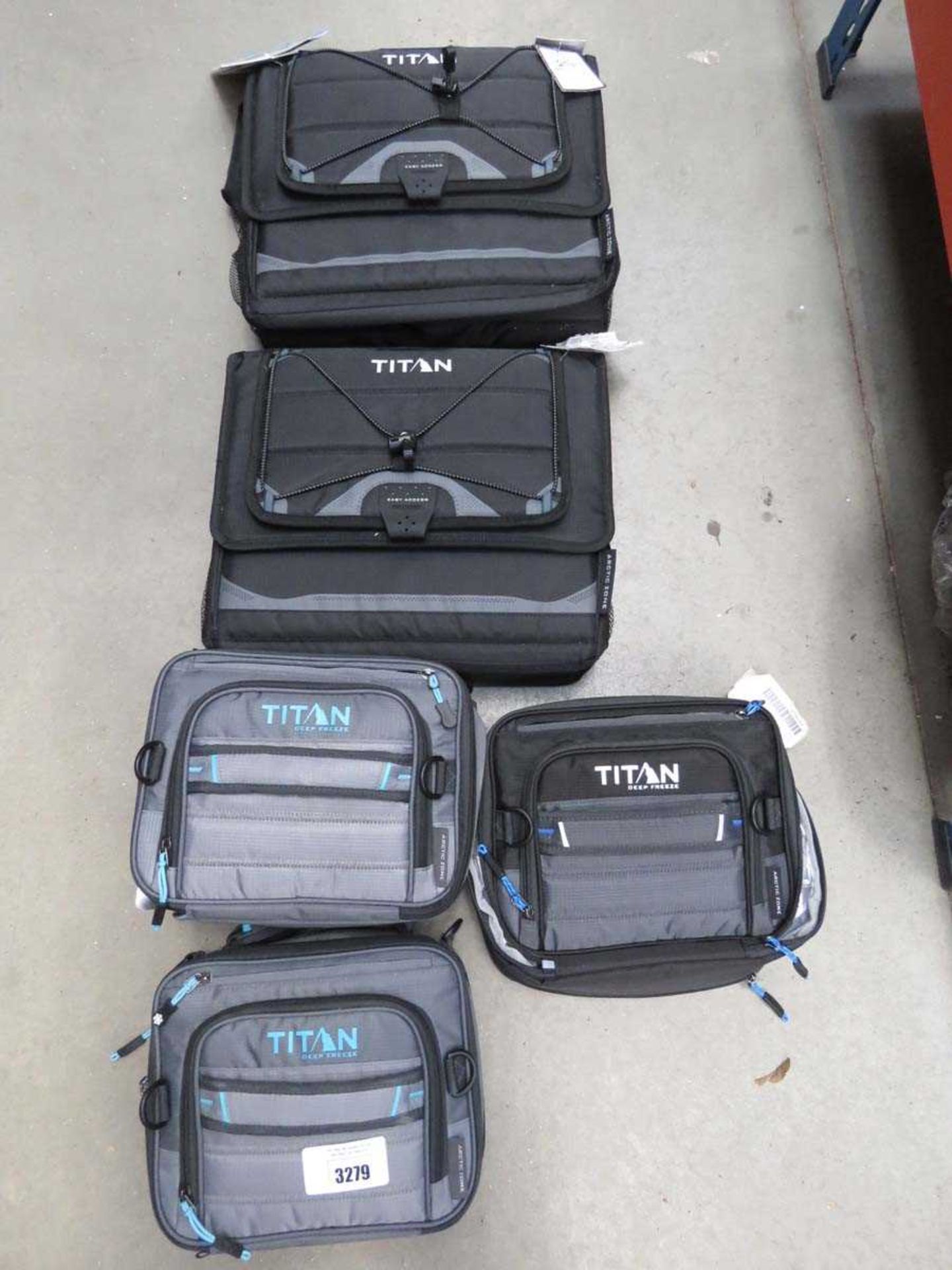 +VAT Three Titan lunch boxes plus a Titan cooler bag