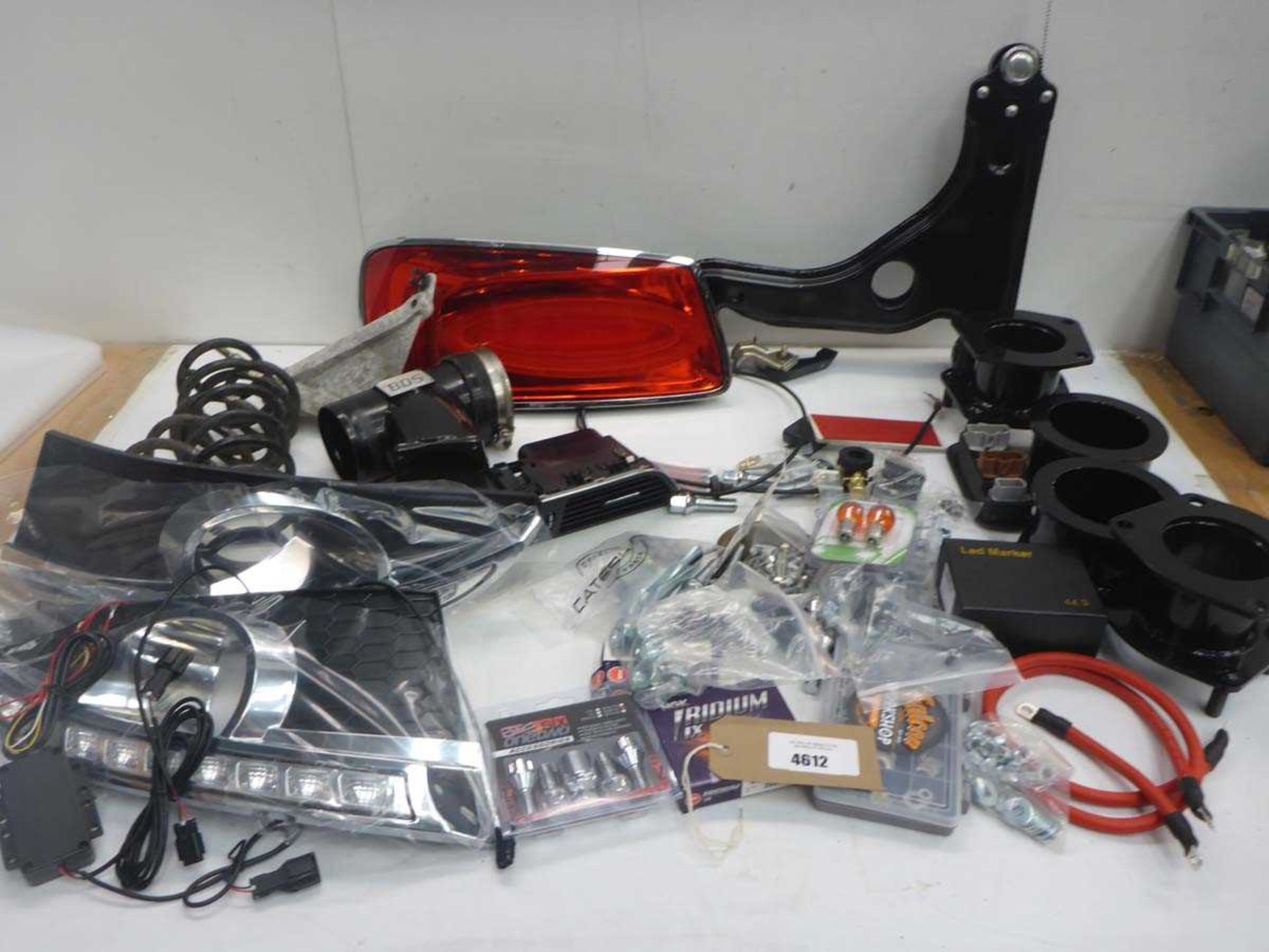 +VAT Car accessories including locking wheel nuts, washers, LED Marker, battery cables, springs,