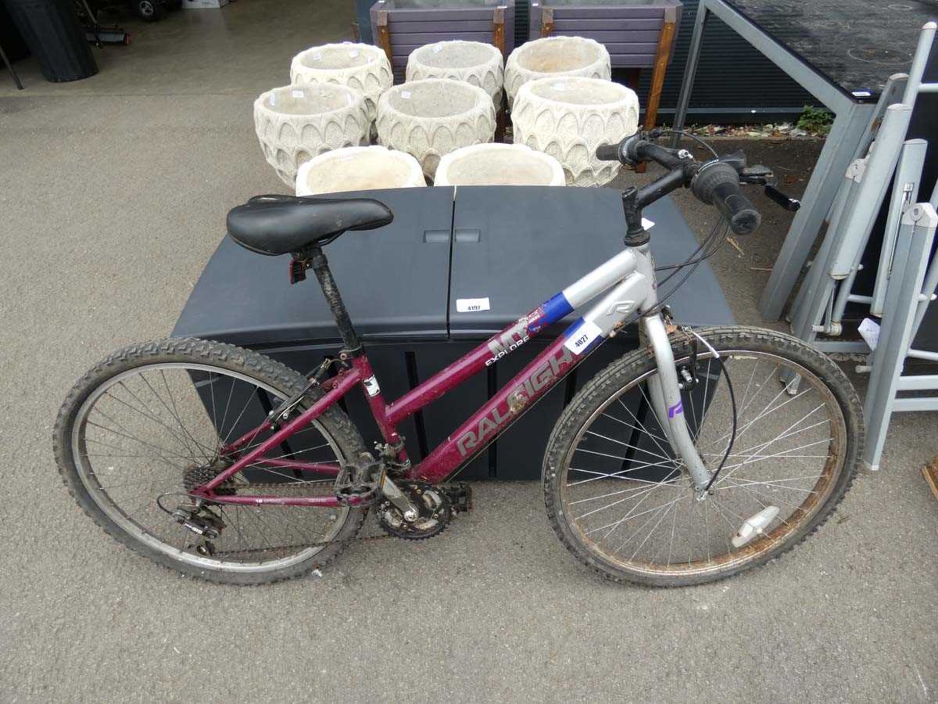 Raleigh mountain bike in purple and silver