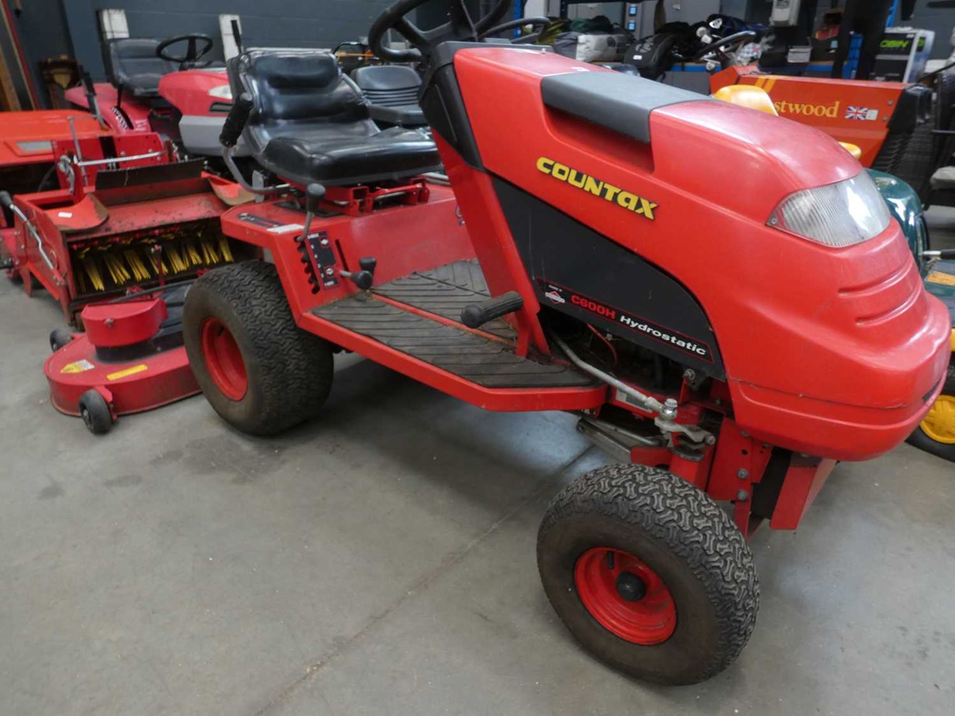 Countax C6008 hydrostatic ride on lawn mower with Tedder leaf collector, aerator, grass box and - Image 4 of 5