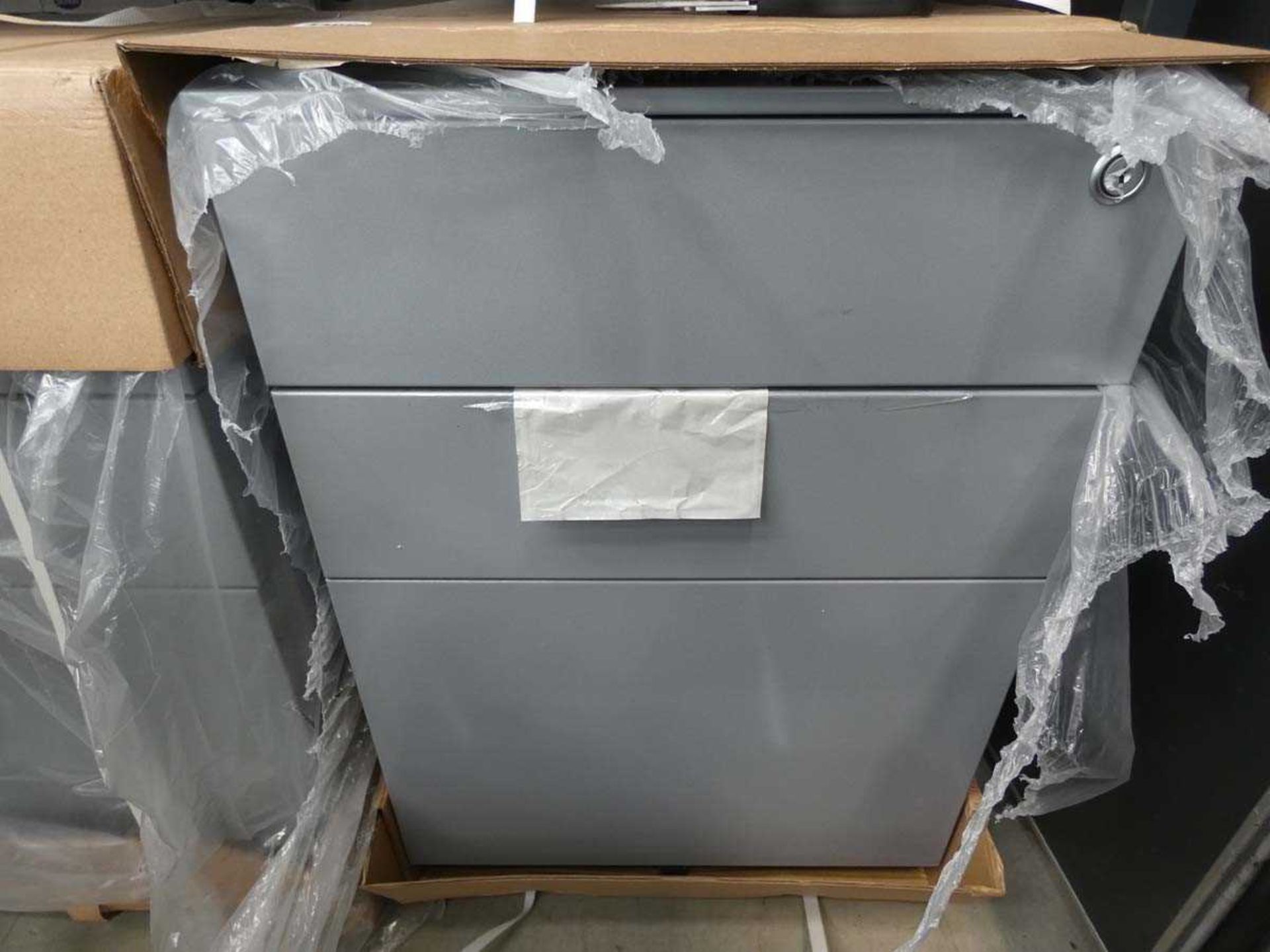 Boxed three drawer pedestal in grey
