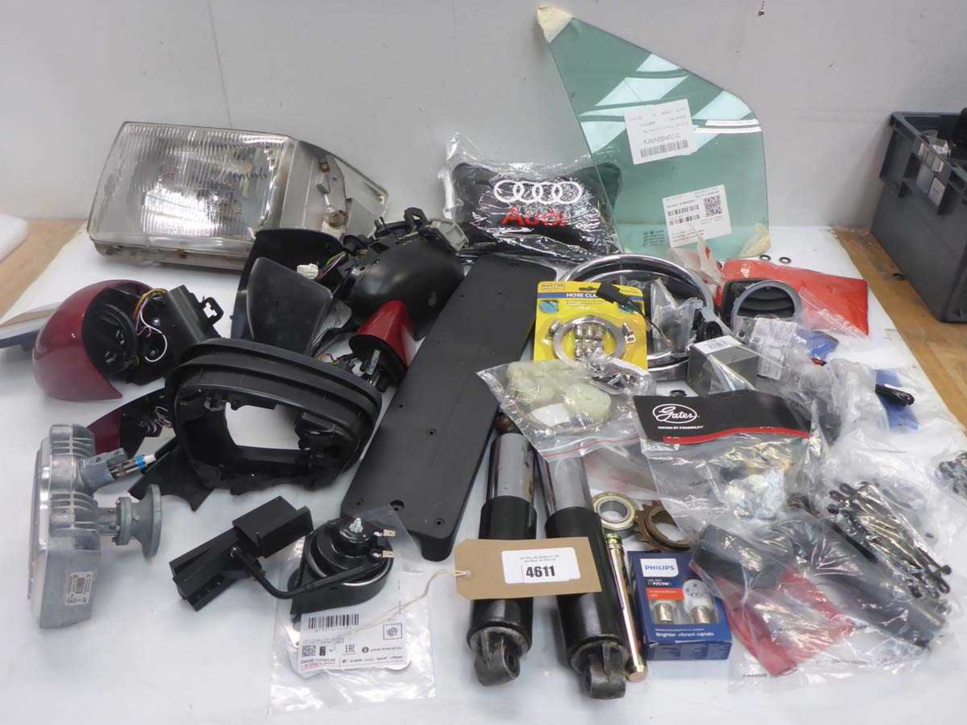 +VAT Car accessories including headlights, wingmirrors, shock absorbers, hose clamp set, hose,