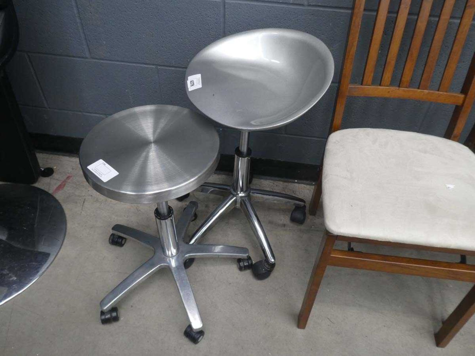 +VAT Small aluminium seated mobile stool with a similar stool