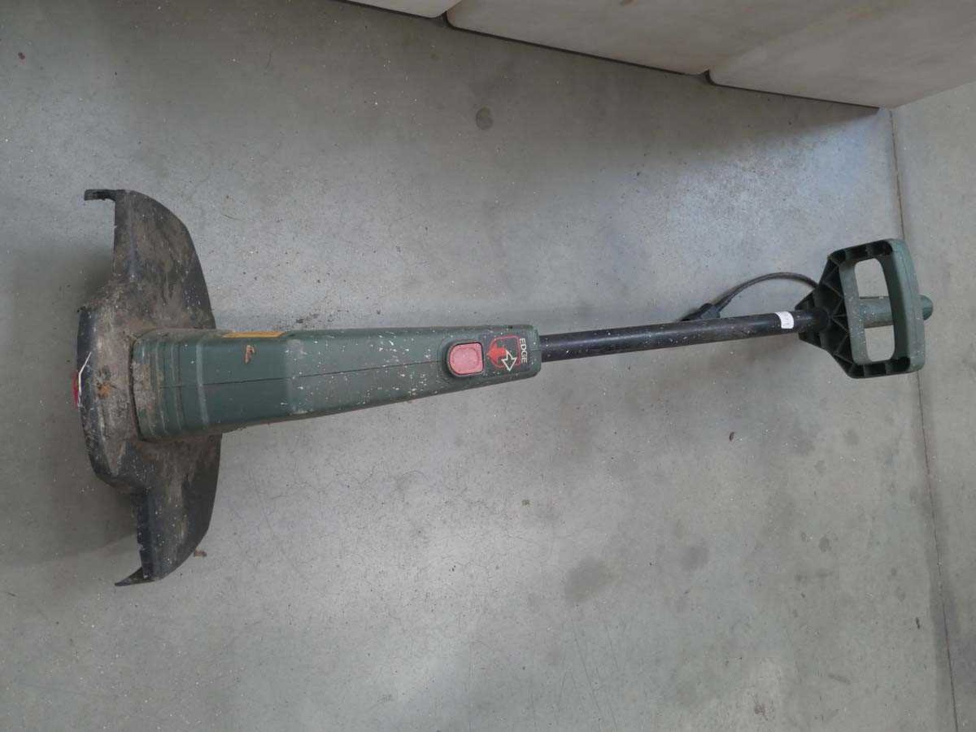 Small green electric strimmer