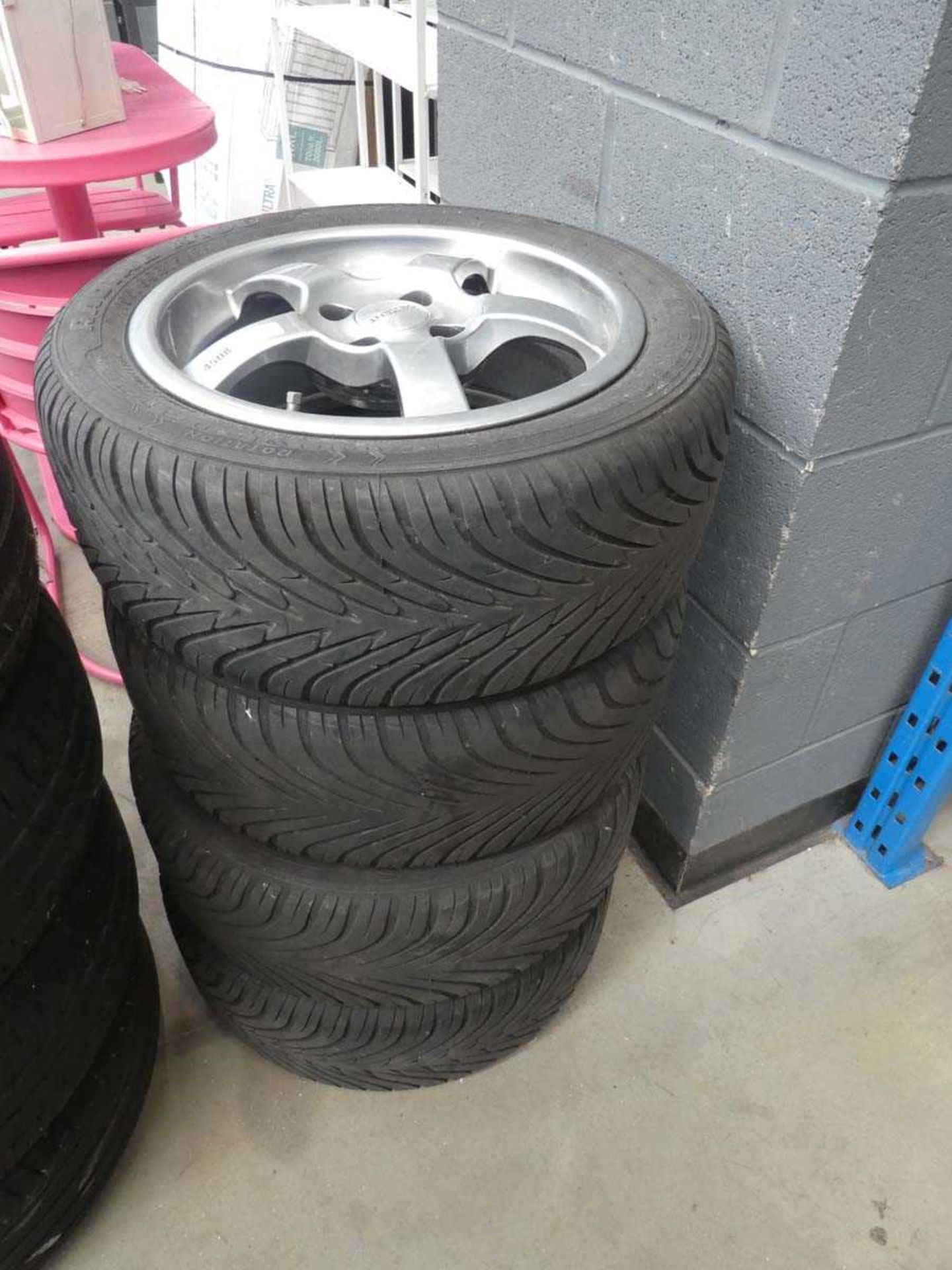 Stack of 4 Dezent alloy wheels with radial K106 195/50 R15 tyres