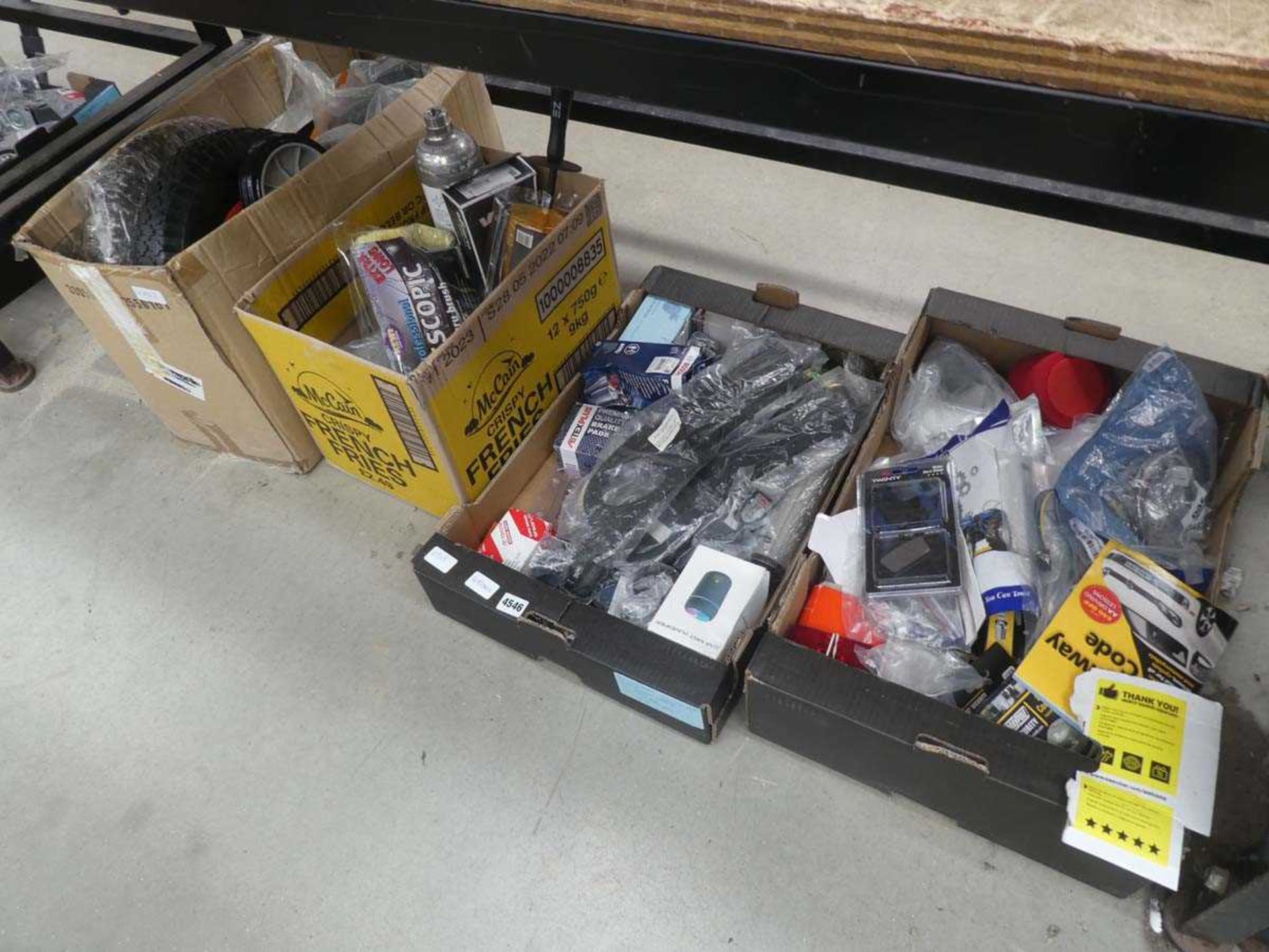 4 boxes of various car parts, cleaning accessories, pneumatic wheels, etc