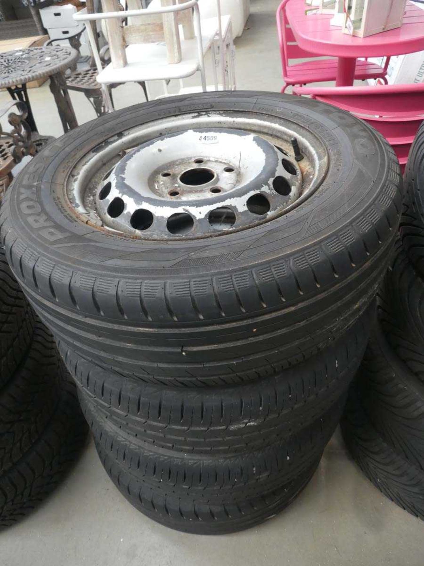 5 assorted steel wheels and tyres