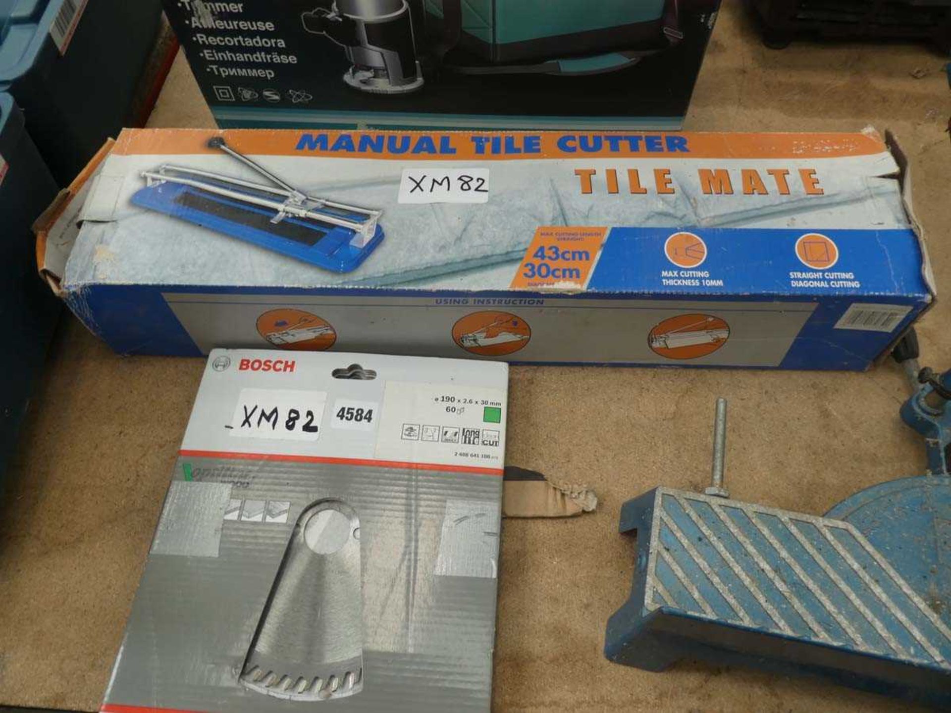 Manual tile cutter, 2 manual mitre saws and 2 packs of Bosch circular saw blades