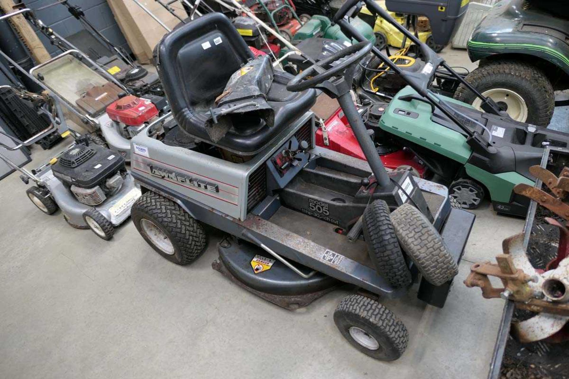 Lawn Flite 505 petrol powered ride on mowerNeeds new battery