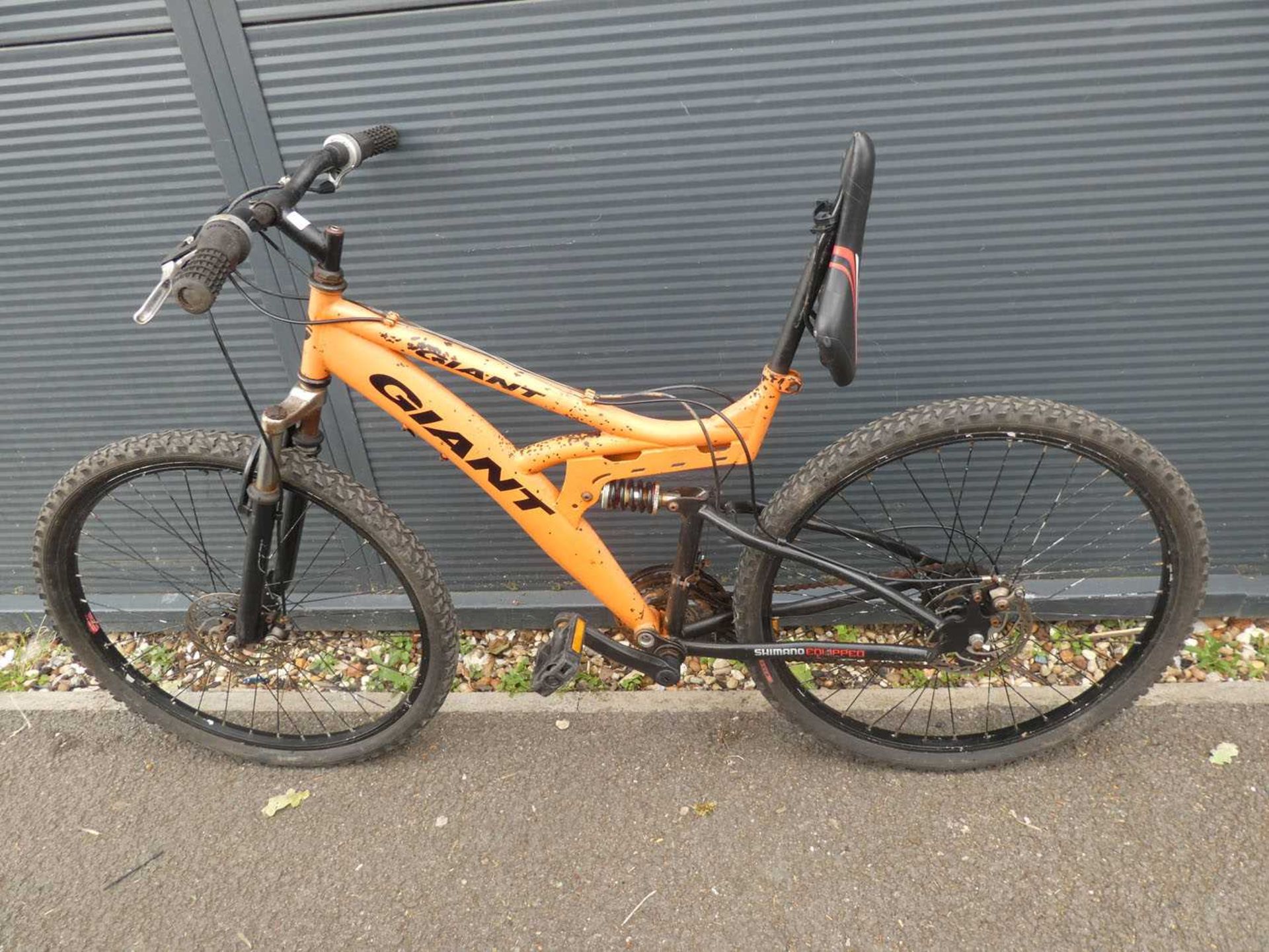 Orange giant child's mountain bike