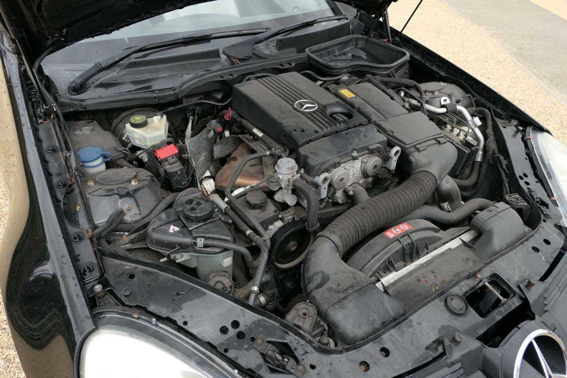 YP06 ECZ (2006) Mercedes 200 SLK Kompressor 1.8 litre automatic two door convertible in black, - Image 7 of 12