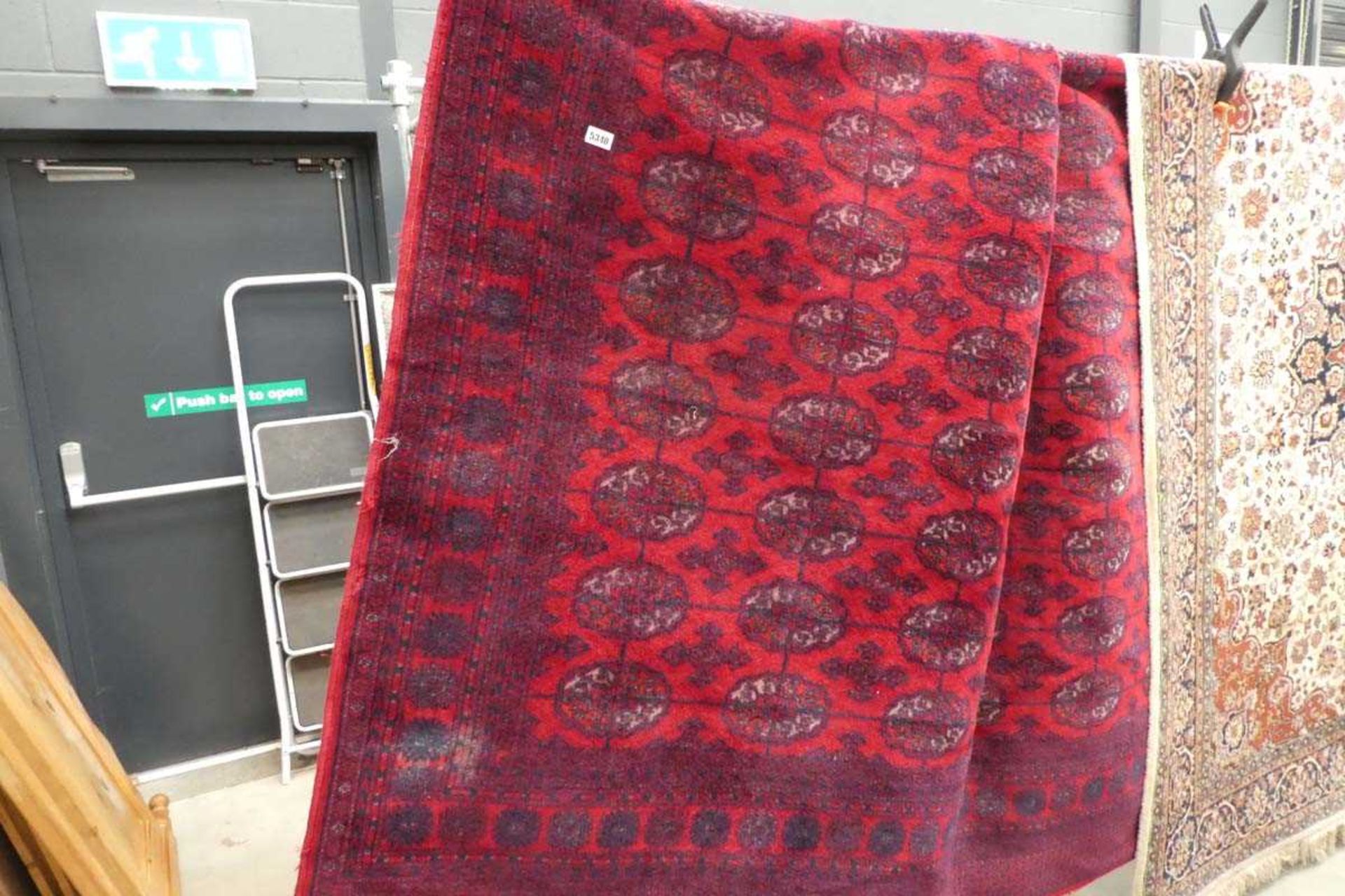 Large Bokhara red carpet with floral design