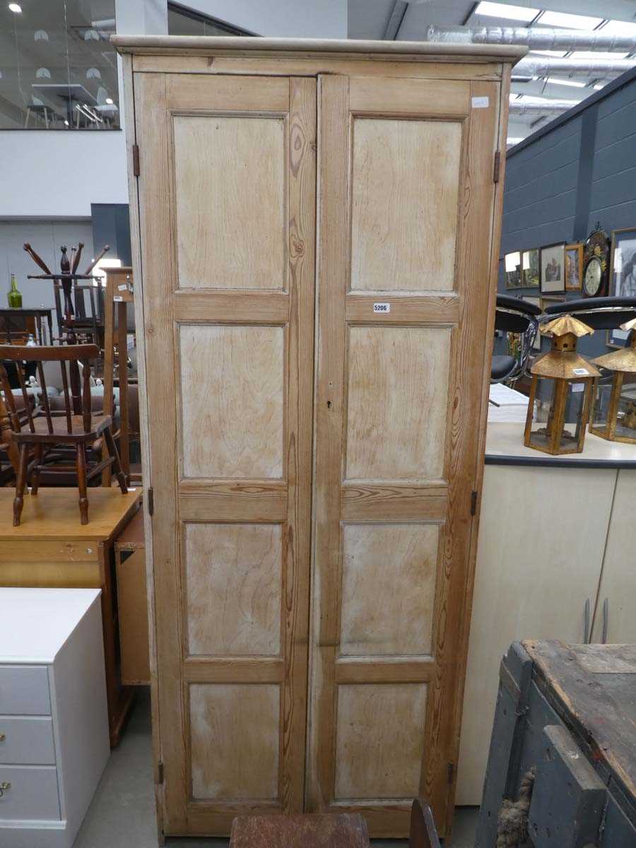 Stripped pine double door cupboard