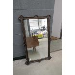 Rectangular bevelled mirror in oak frame