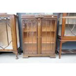 Glazed oak double door china cabinet