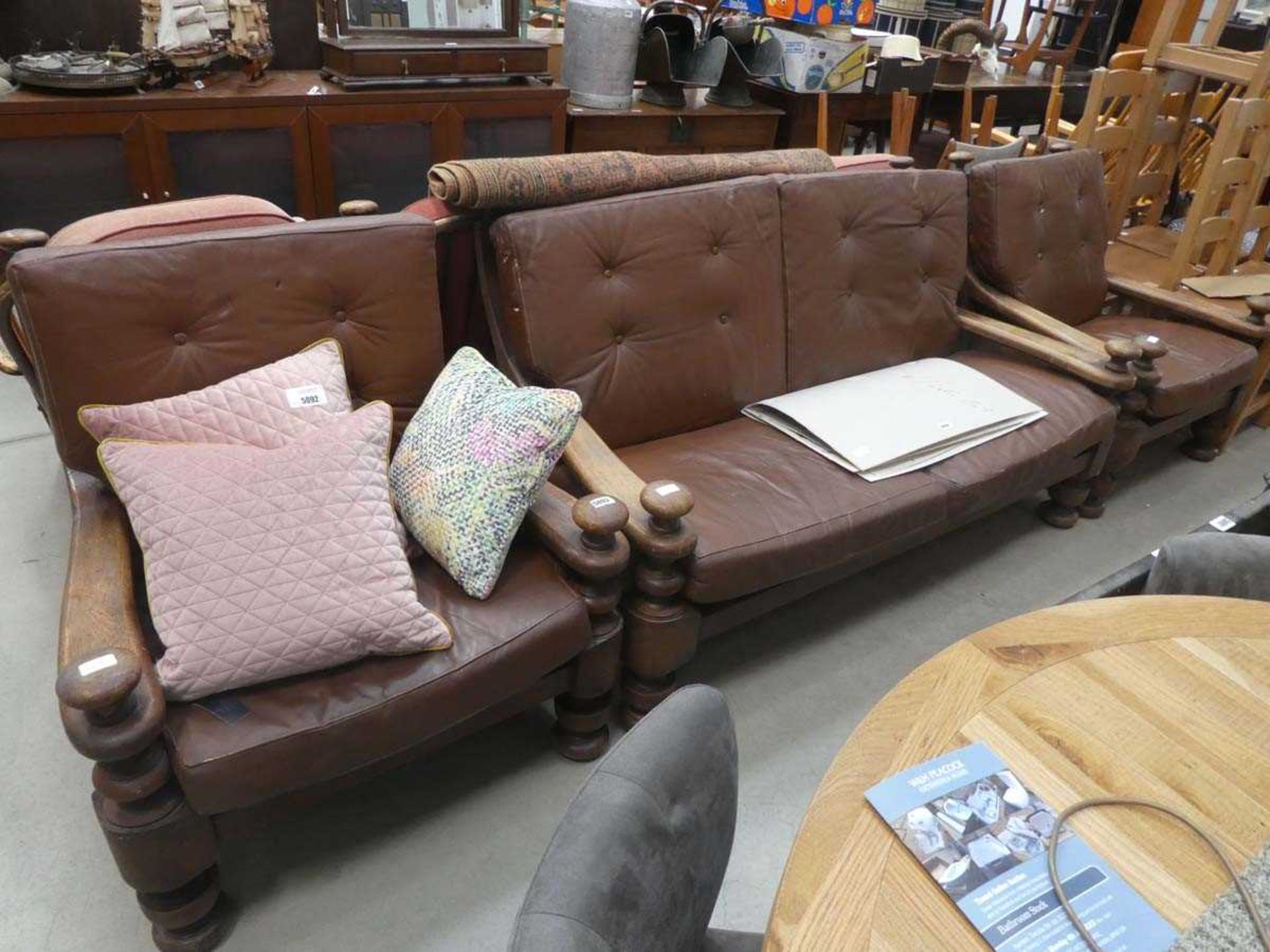 Oak lounge suite comprising two seater sofa and a pair of matching armchairs