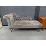 Chaise longue in brown fabric