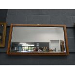 Rectangular bevelled mirror in oak frame