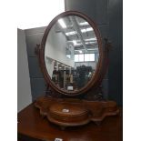 Oval toilet mirror